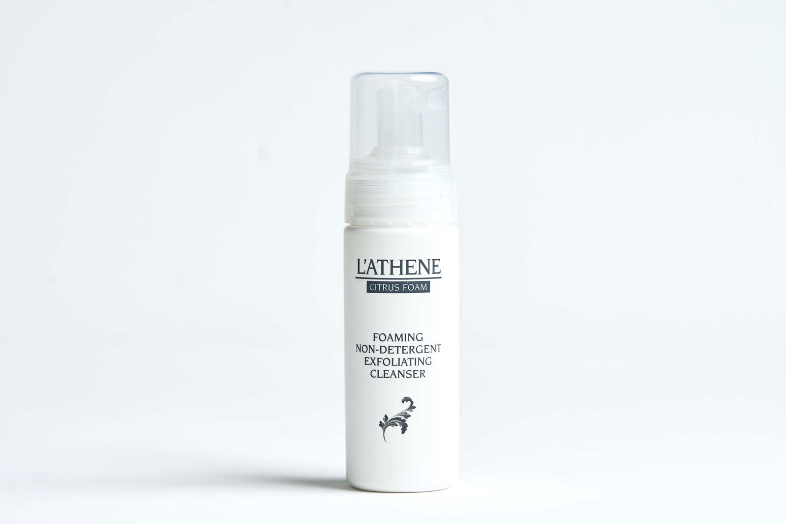 L'ATHENE Citrus Foam Exfoliating Cleanser, white bottle with clear cap against a white background