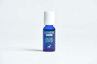 L'ATHENE EXTRACT Dry Skin Hydrating Plant Oil in a blue glass bottle with white cap, isolated on white background